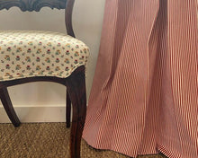 Load image into Gallery viewer, Beautiful 18th century chair upholstered in Howe of England fabric, set against a seagrass carpet and red & white ticking curtains.